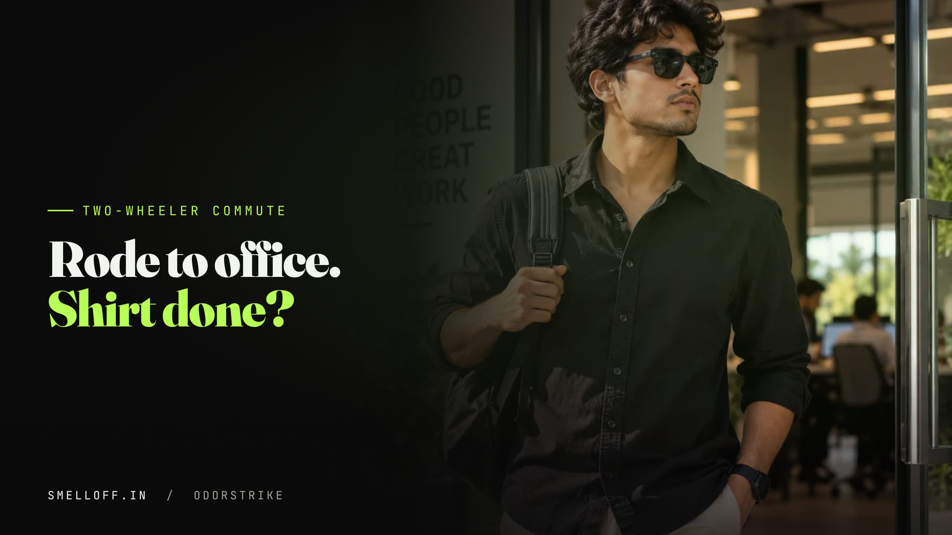 A man in a black shirt walks out of his office at the end of a day of commuting