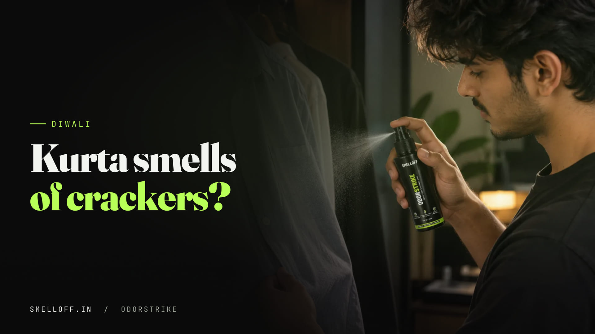 A man mists a light-blue shirt hanging in his wardrobe with a fabric odor spray, the morning after a smoky evening