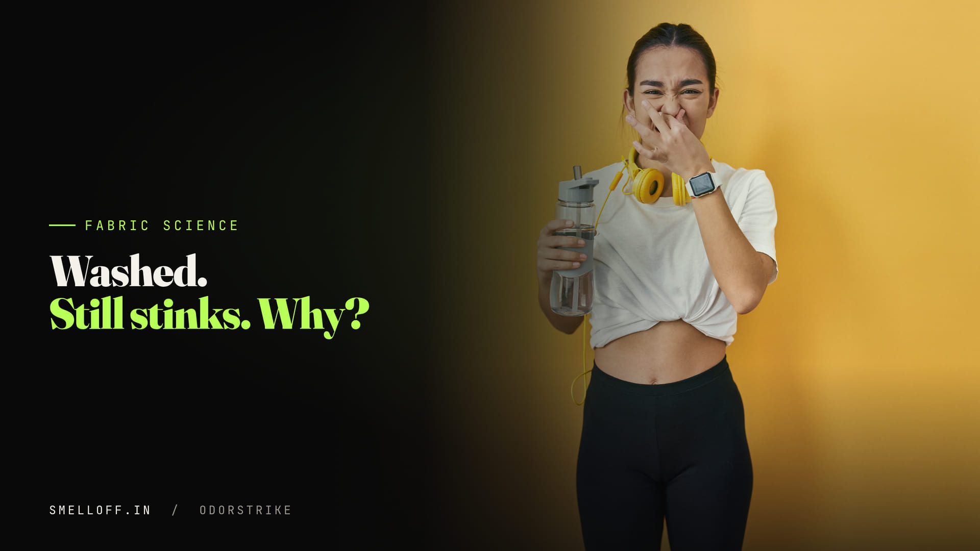 A woman in sportswear pinches her nose at the smell of gym clothes that have already been washed